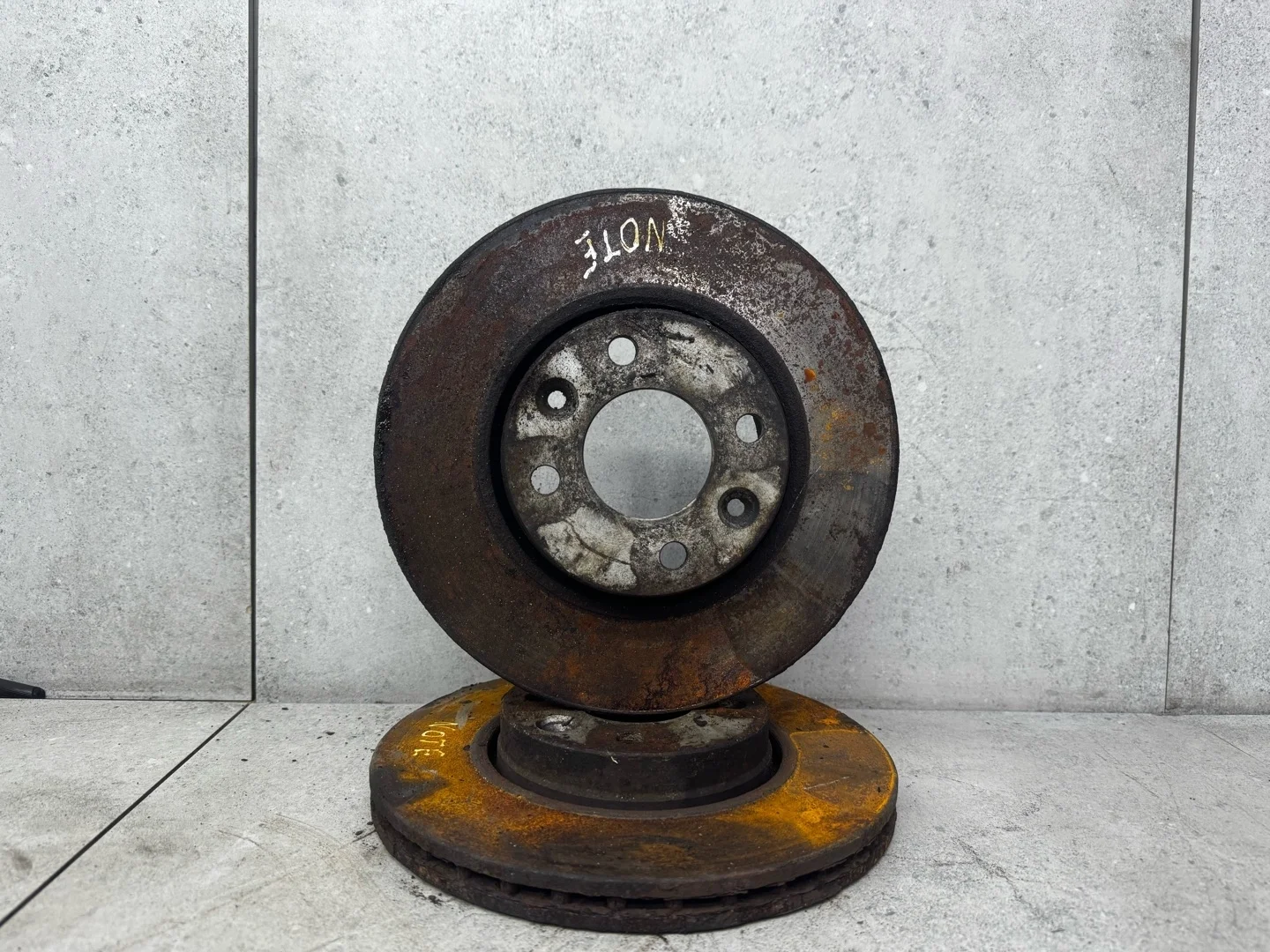 Диск тормозной передний Nissan Note E11 40206AX600