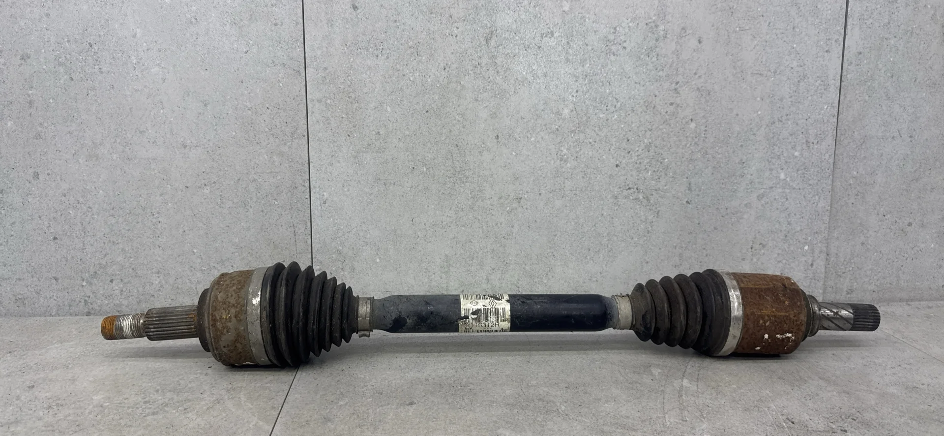 Полуось передняя левая Renault Laguna 3 391016312R