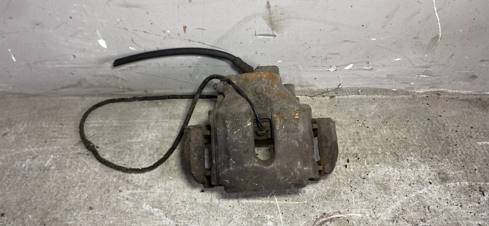 Суппорт тормозной левый BMW X5 E53 рест.