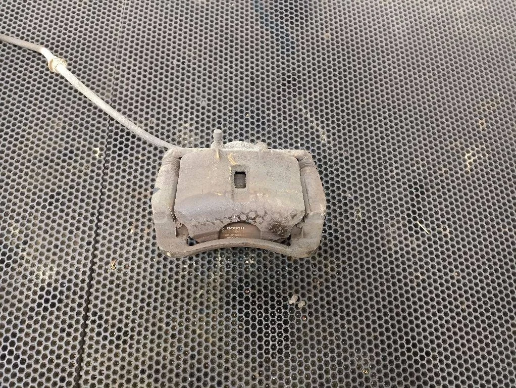 Суппорт тормозной передний правый Nissan Qashqai