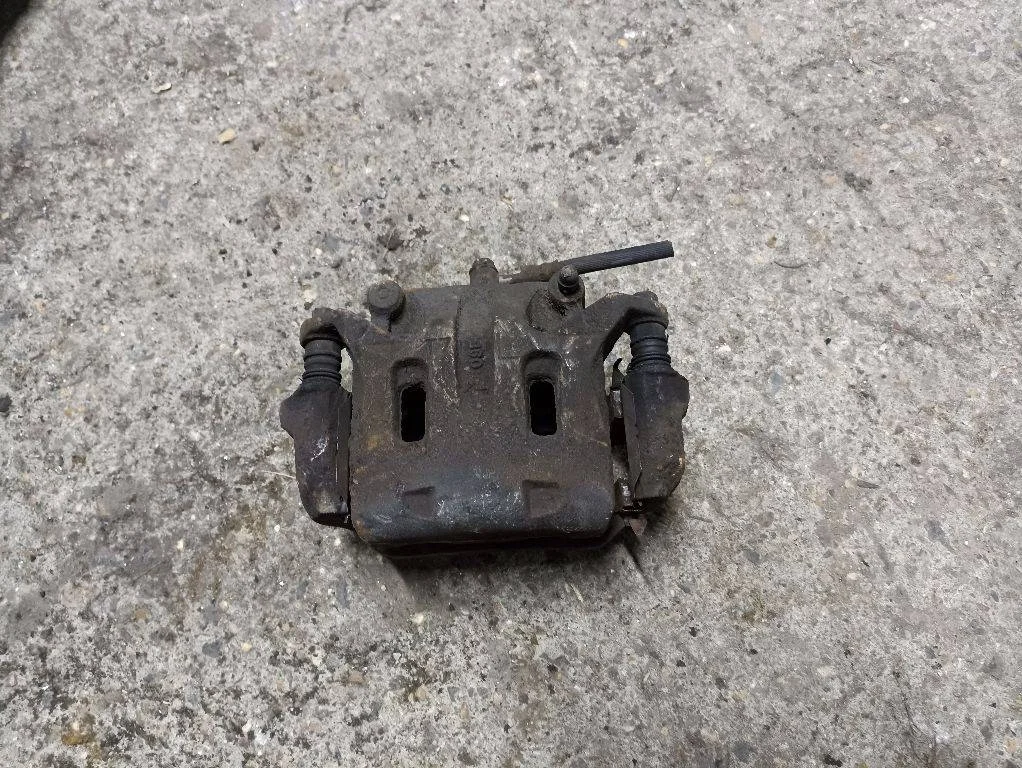 Суппорт тормозной передний левый Renault Koleos