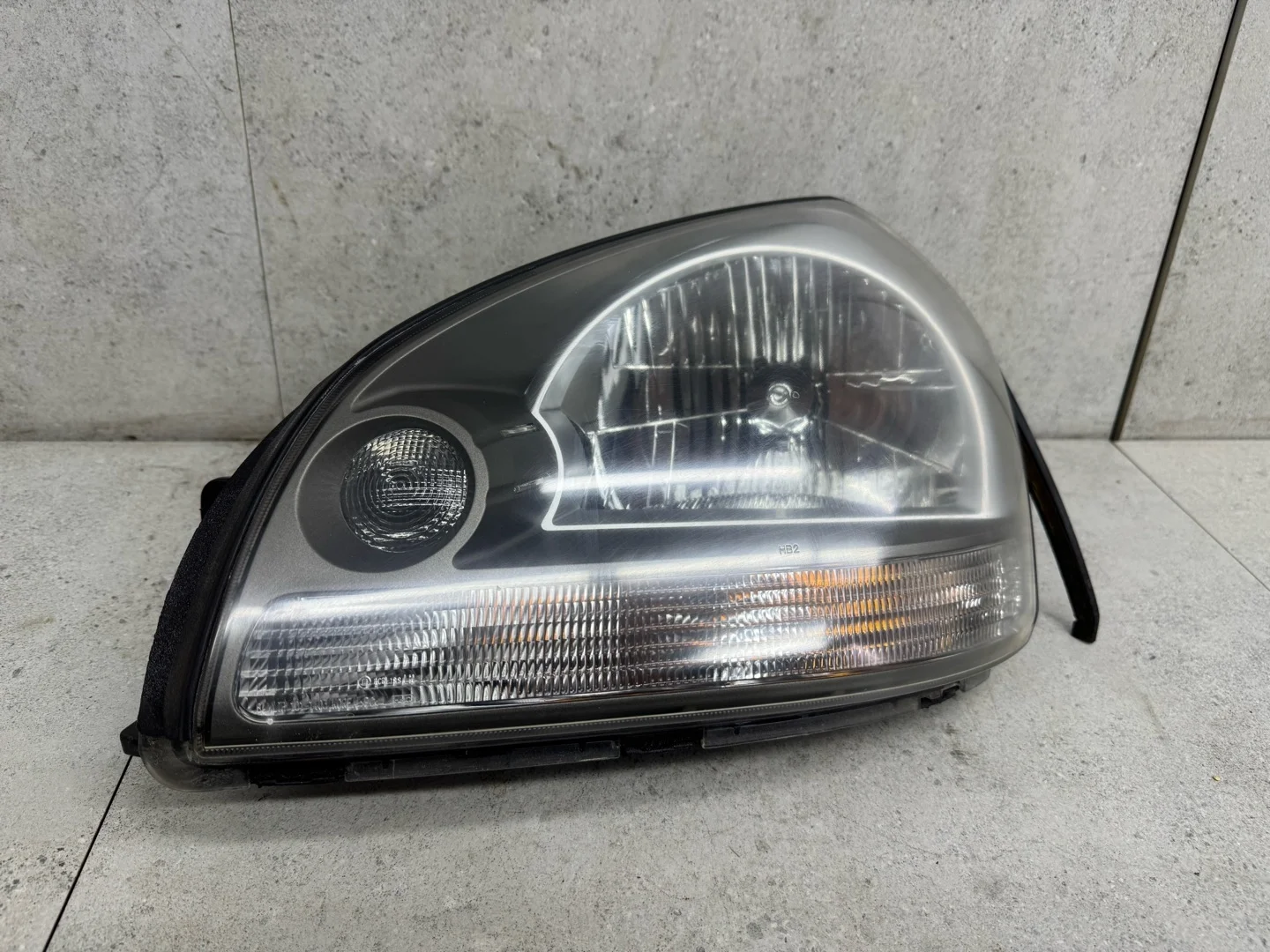 Фара левая Hyundai Tucson 2007 921012E010