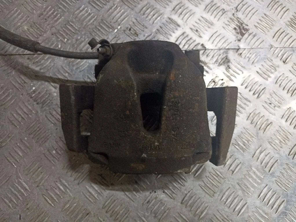 Суппорт тормозной передний левый BMW X5 E70 рест.