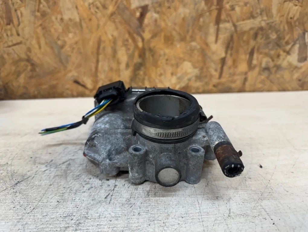 Дроссельная заслонка Opel Corsa D Z14XEP