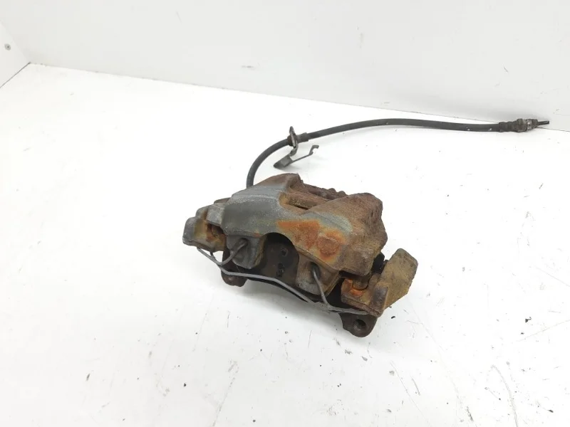 Суппорт тормозной Volkswagen Tiguan 2007-2011