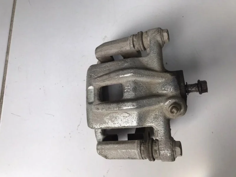 Суппорт тормозной задний правый Chevrolet Lacetti