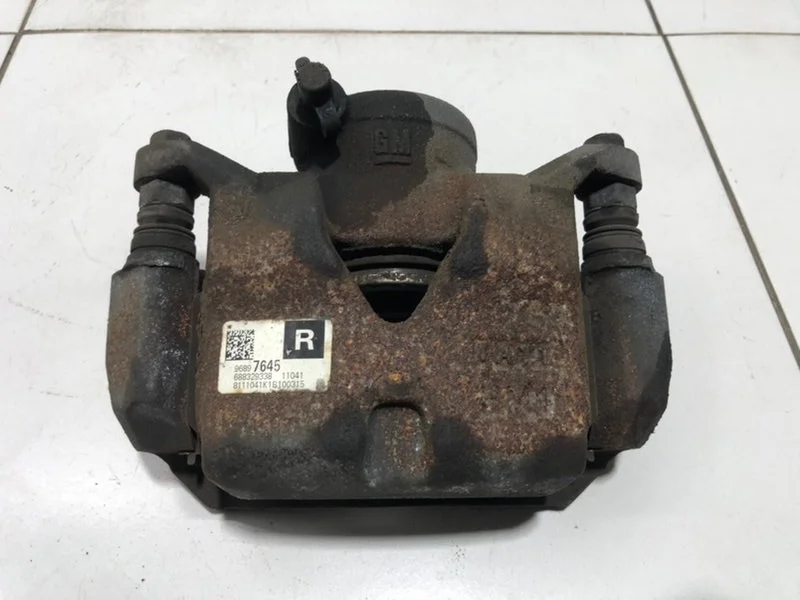 Суппорт тормозной передний правый Chevrolet Aveo