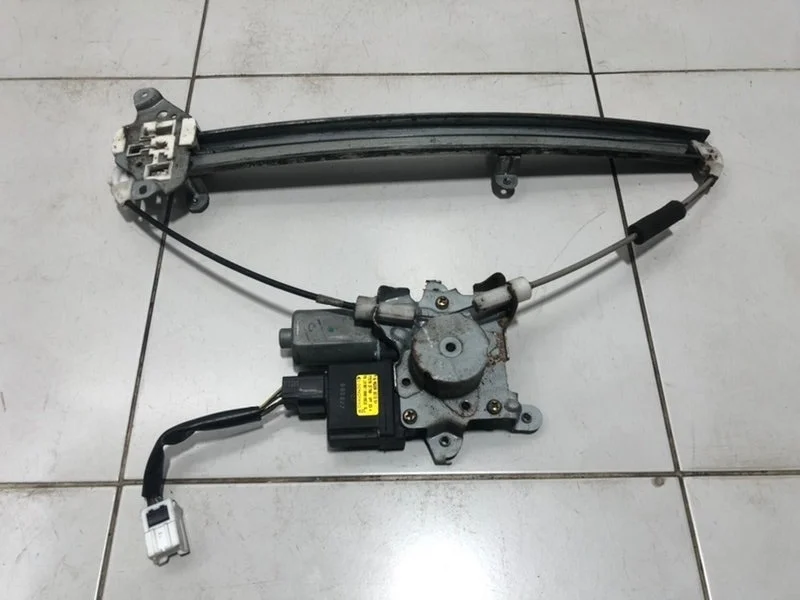 Стеклоподъемник элект. передний левый Nissan