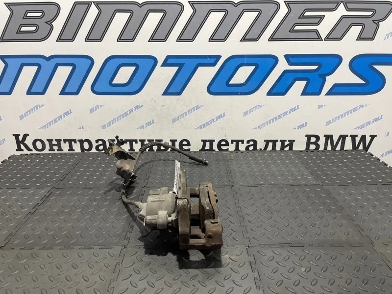 Суппорт тормозной BMW 316 34116850649 F30 N13B16, передний левый