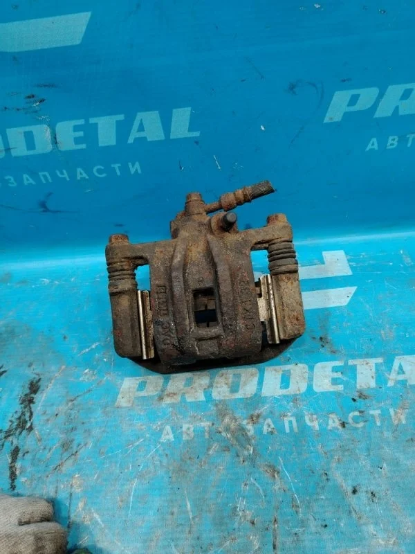 Суппорт тормозной задний правый Chevrolet Lacetti