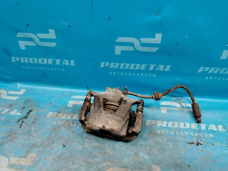 Суппорт тормозной передний правый Chevrolet Cruze