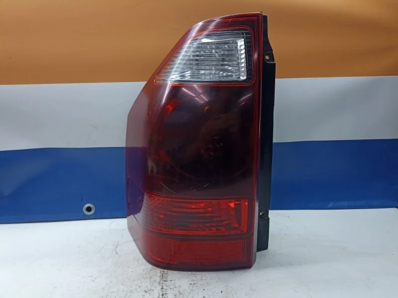 Фонарь Mitsubishi Pajero 2006 MN133765 V78W 4M41, задний левый