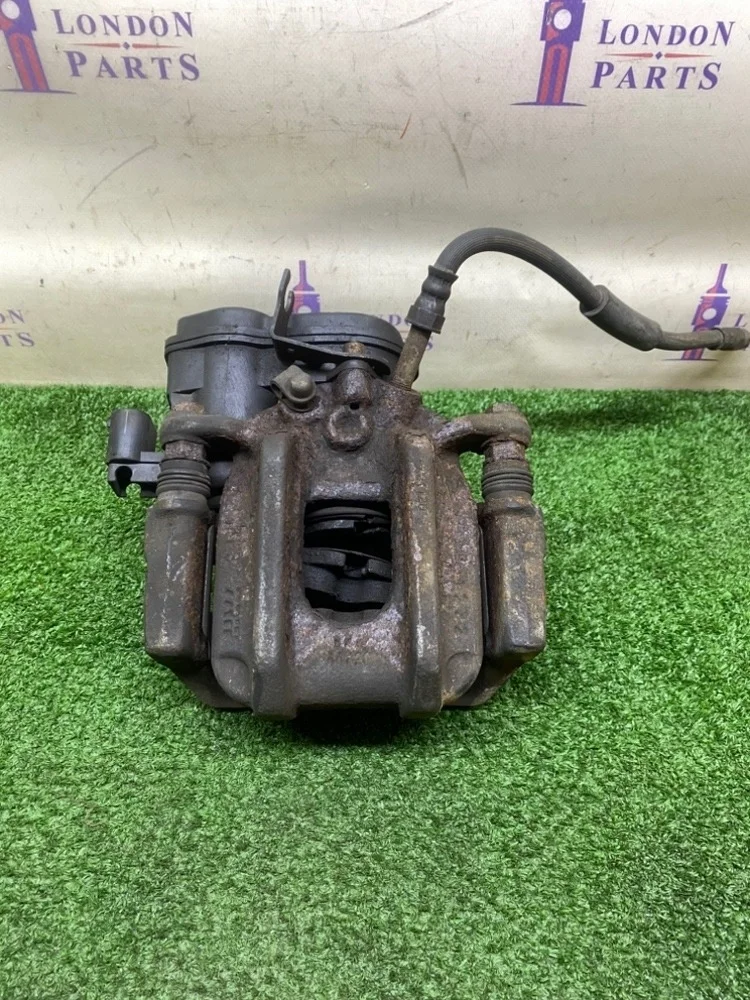 Суппорт тормозной BMW F10