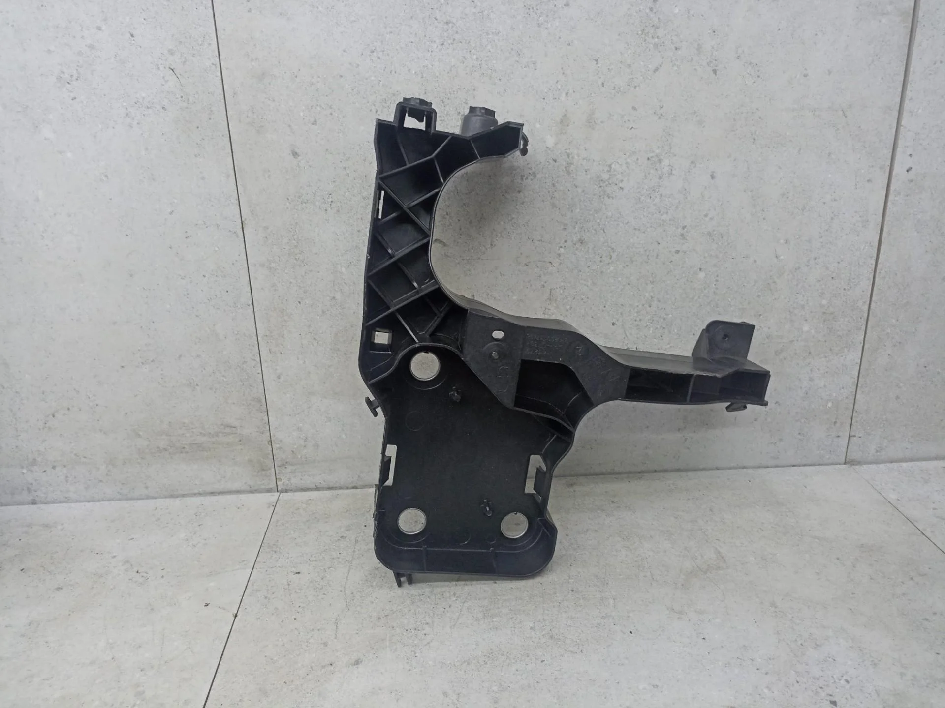 Крепление фары (кронштейн фары) левой Renault