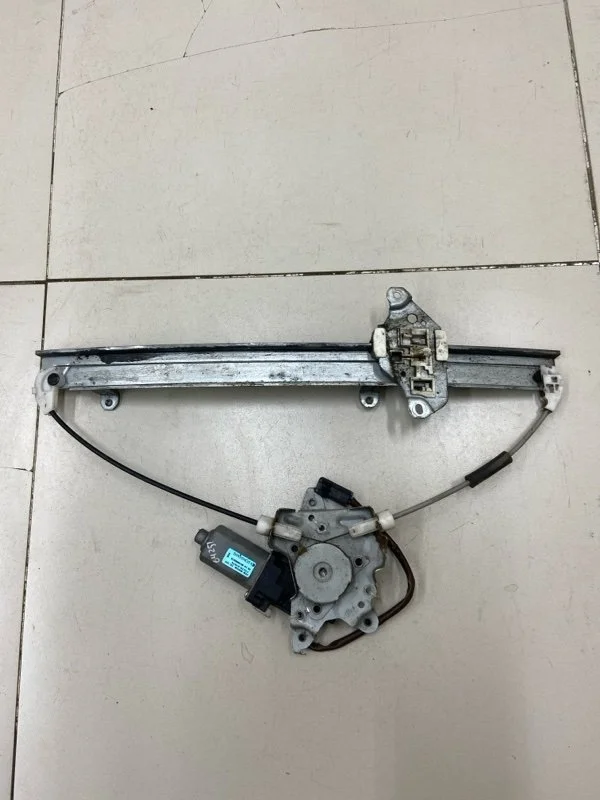 Стеклоподъемник элект. передний левый Nissan