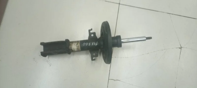 Амортизатор передний левый Renault Fluence