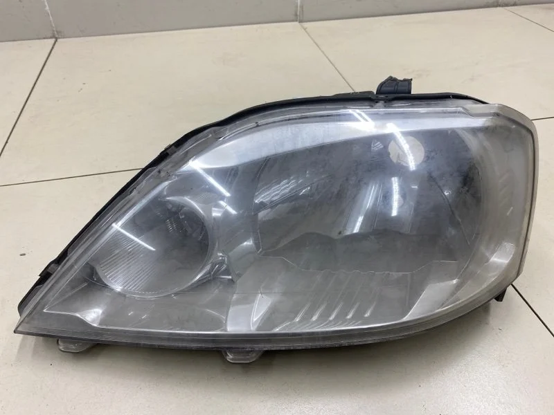 Фара левая Renault Logan 1