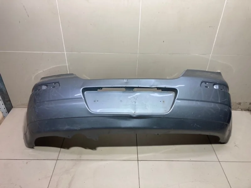 Бампер задний Nissan Tiida C11