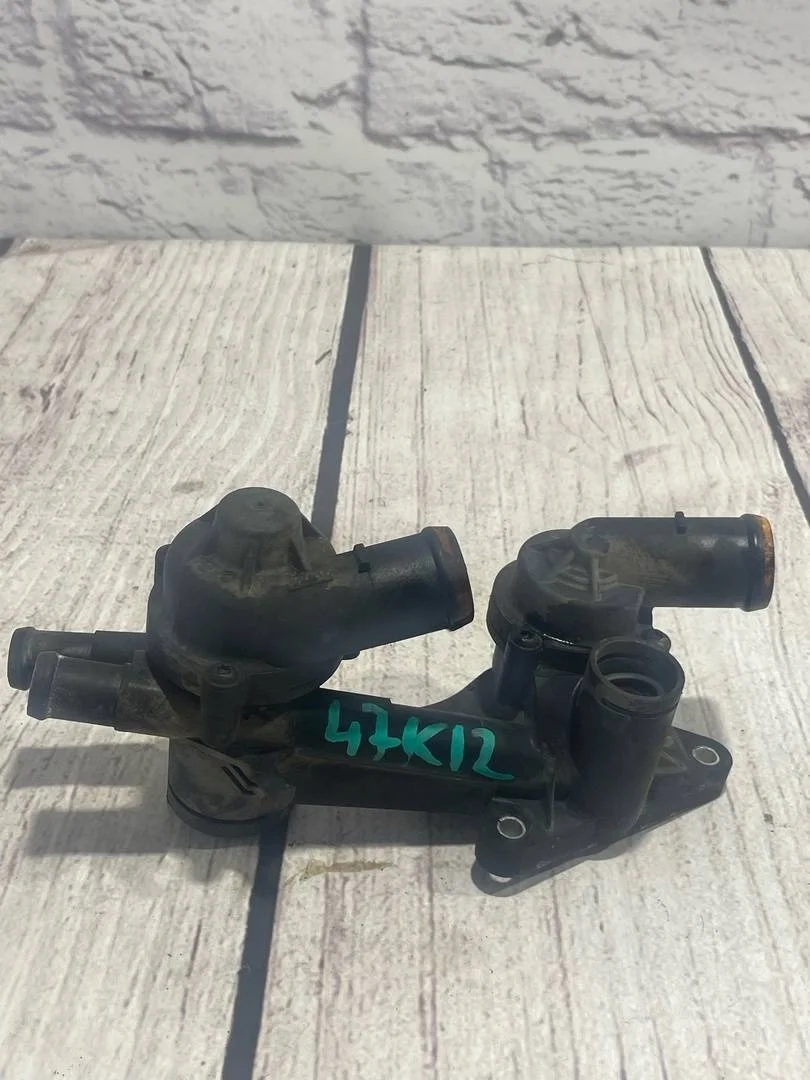 Корпус термостата VW Tiguan 1 2011