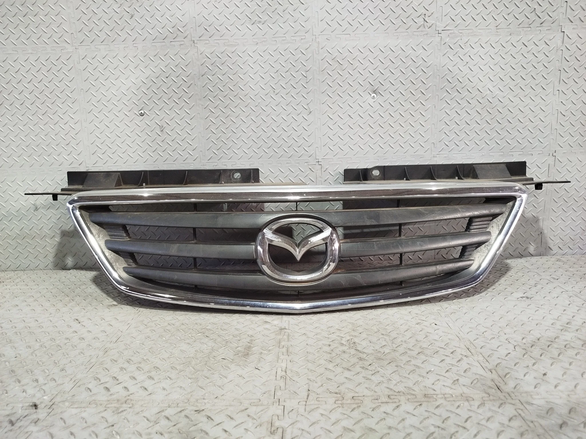 РЕШЕТКА РАДИАТОРА MAZDA LC6250710A S3949Z