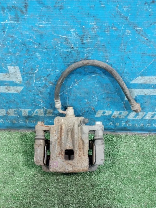 Суппорт тормозной задний правый Ssang Yong Actyon