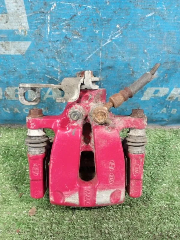 Суппорт тормозной задний левый Kia Ceed G4FJ