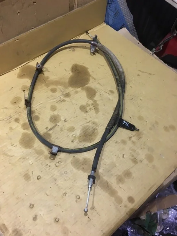 Трос стояночного тормоза левый Toyota Land Cruiser 2015 4643060030 URJ200 1VD-FTV 4.5