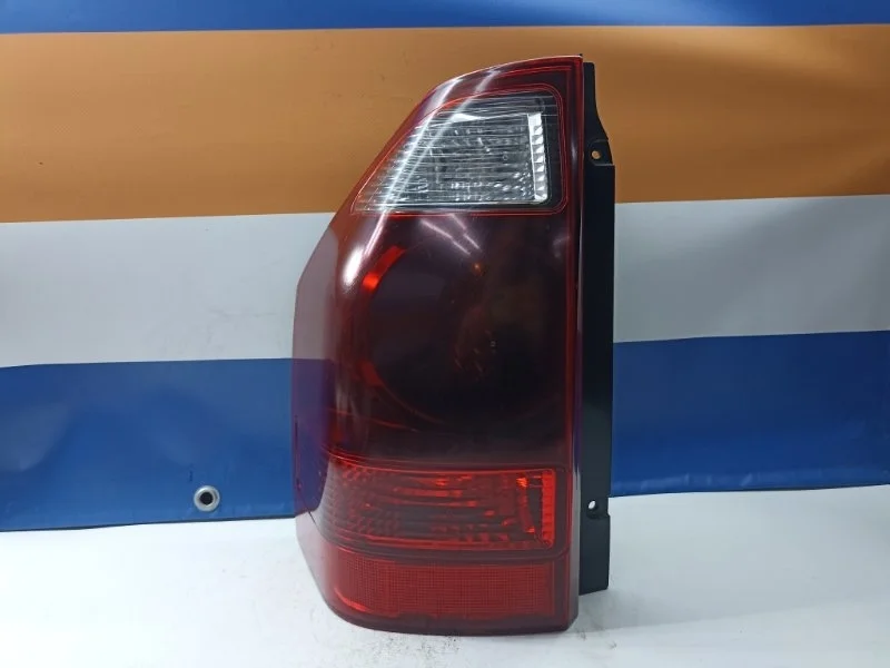 Фонарь Mitsubishi Pajero 2005 MN133765 V78W 4M41, задний левый