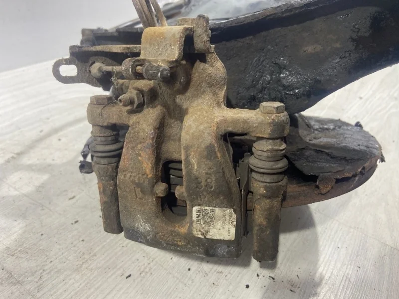 Суппорт задний левый Ford Mondeo 4 (07-14) ХЭТЧБЕК