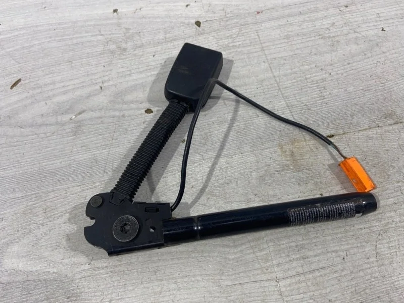 Преднатяжитель ремня безопасности левый FORD