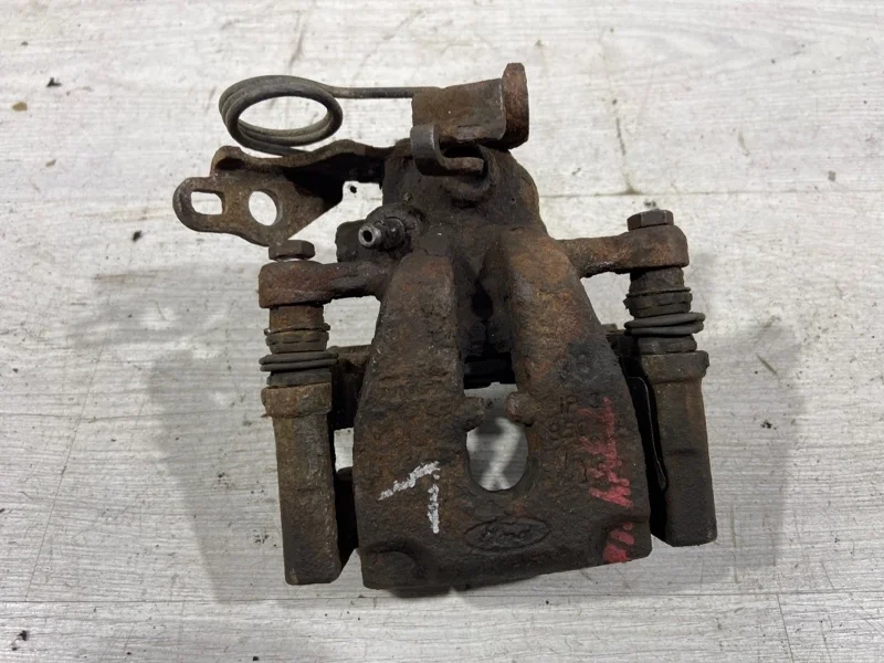 Суппорт задний левый Ford Mondeo 4 (07-14)