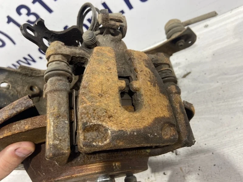 Суппорт задний левый Ford Mondeo 4 (07-14) ХЭТЧБЕК