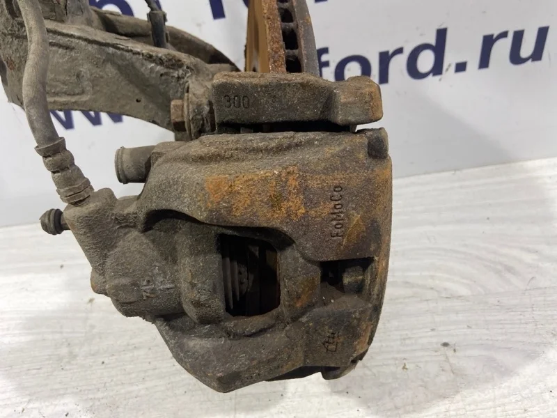 Суппорт передний левый Ford Mondeo 4 (07-14)