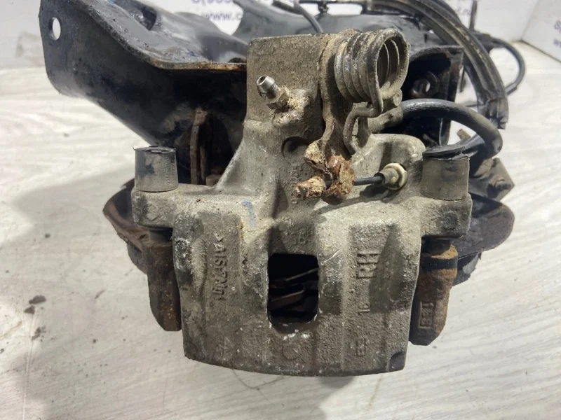 Суппорт задний правый Ford Focus 3 (11-14) ХЭТЧБЭК