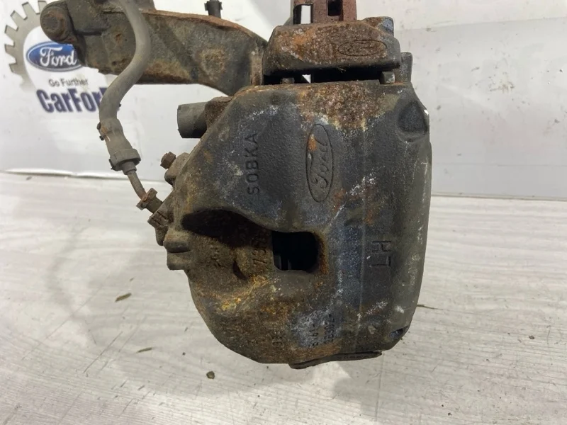 Суппорт передний левый Ford Kuga 2 (12-19) SUV