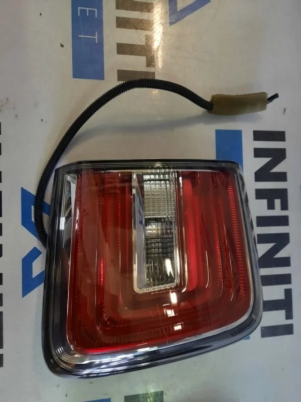 Фонарь в крышку багажника задний левый NISSAN