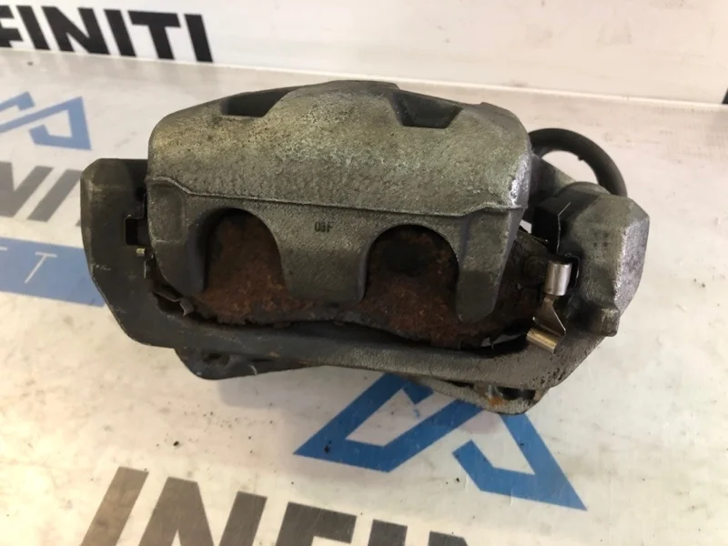 Суппорт тормозной передний левый INFINITI Q70 Y51