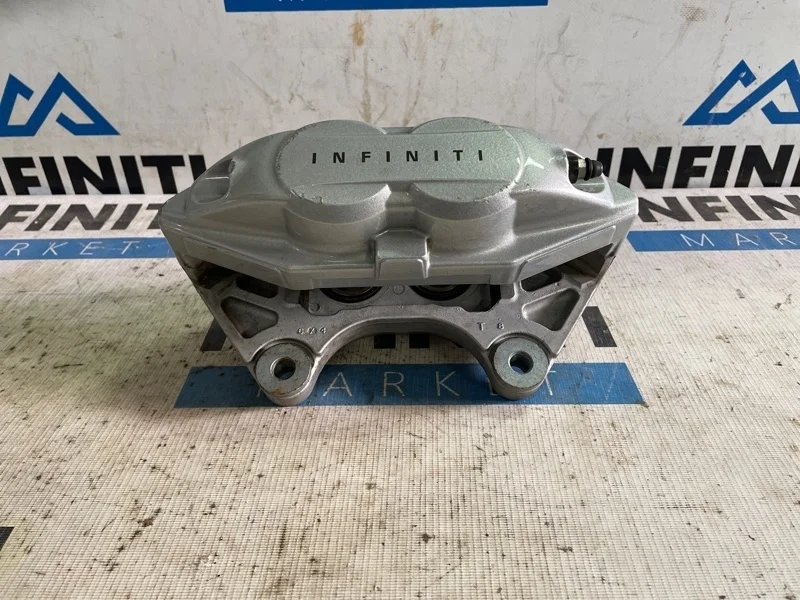 Суппорт тормозной Akebono передний левый INFINITI