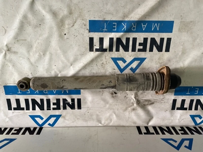 Амортизатор стойка подвески задний левый INFINITI