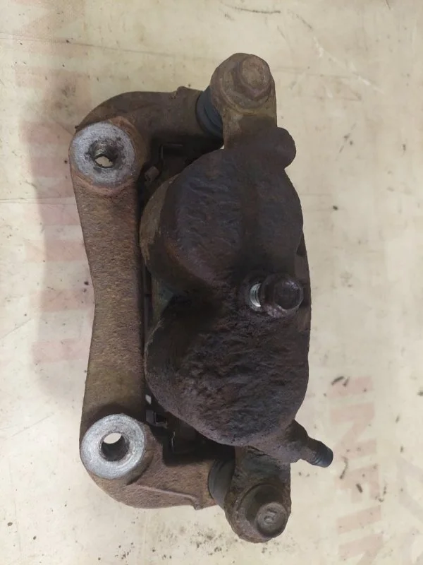 Суппорт тормозной передний левый INFINITI QX80 Z62