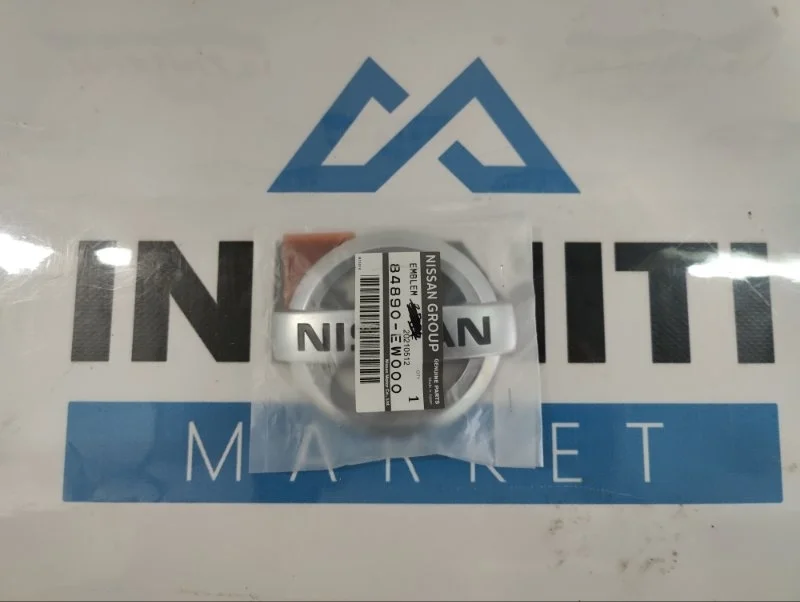 Эмблема крышки багажника NISSAN Terrano D10