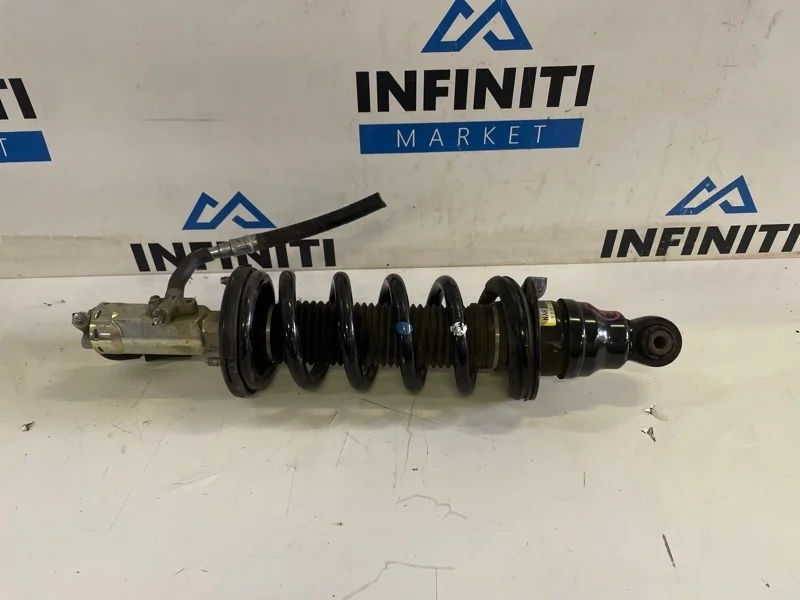 Амортизатор стойка подвески передний правый NISSAN