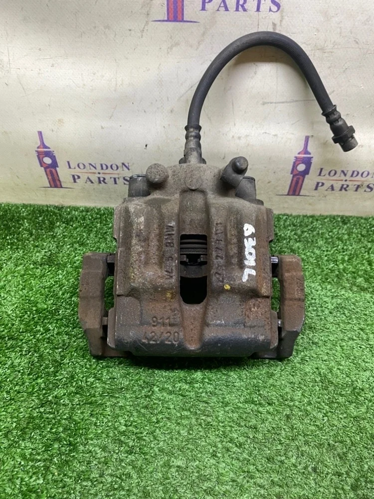 Суппорт тормозной BMW X1 E84