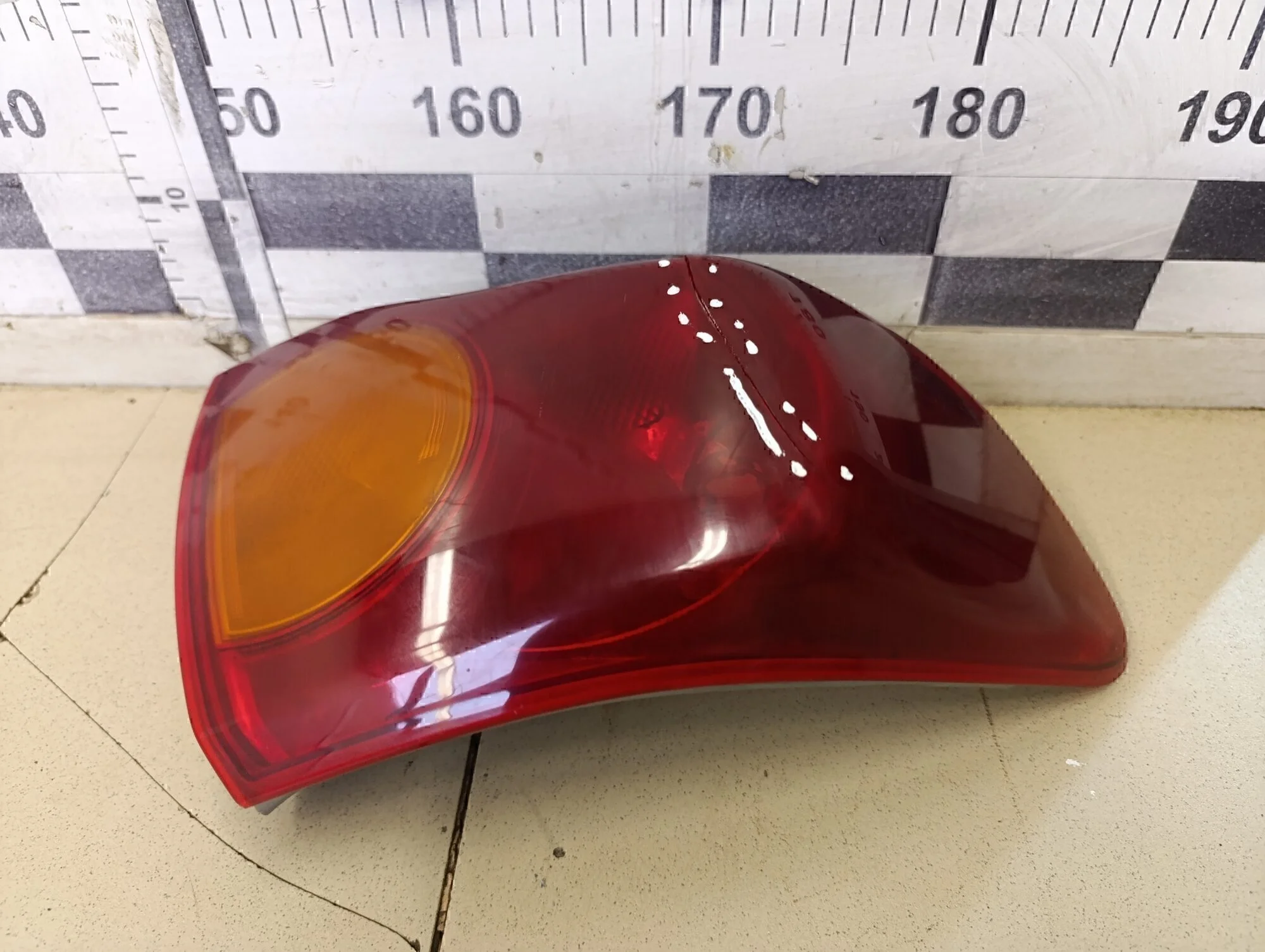 Фонарь задний наружный левый Corolla E15 2006-2013