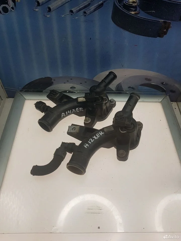 Тройник патрубка охлаждения opel corsa d a14xer