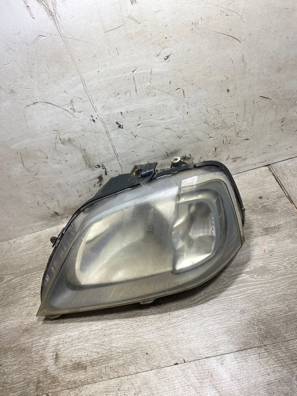 Фара левая Renault Logan I (2004—2009)