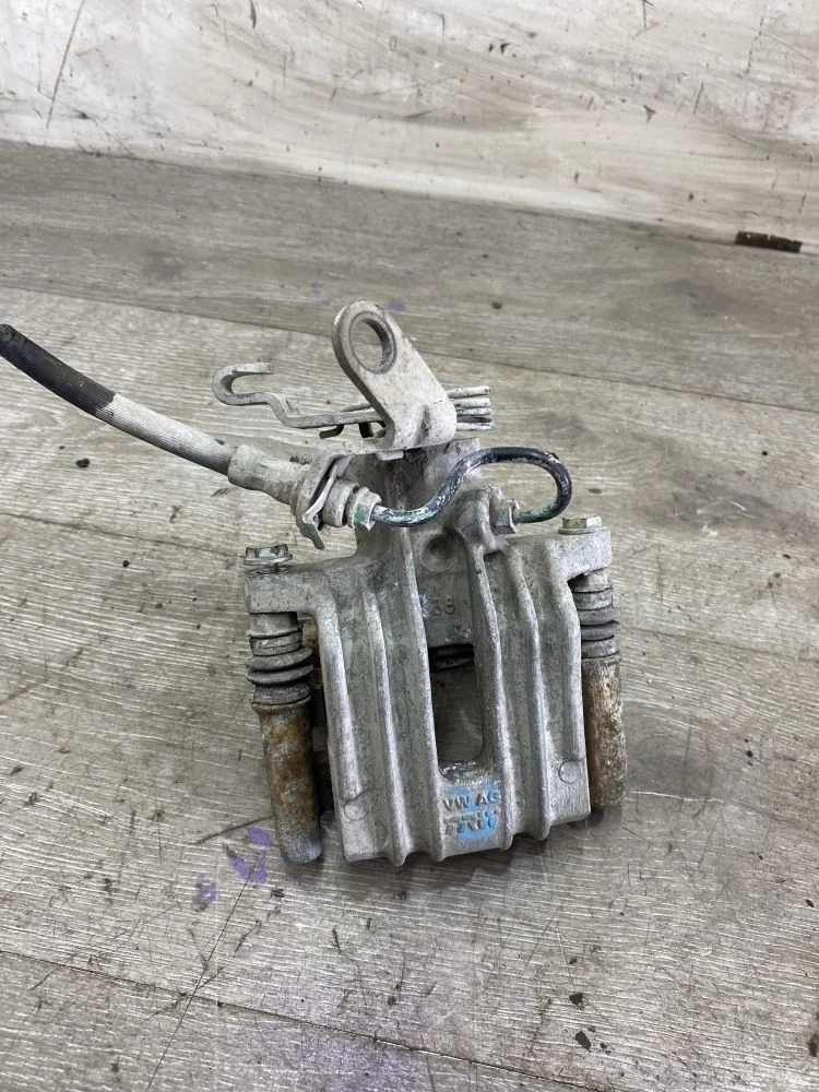 Суппорт тормозной задний правый SEAT Toledo III (2004—2009)