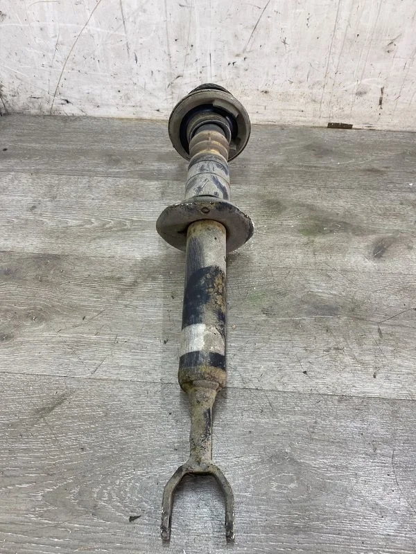 Амортизатор передний левый Audi A6 C5 рестайлинг (2001—2004)