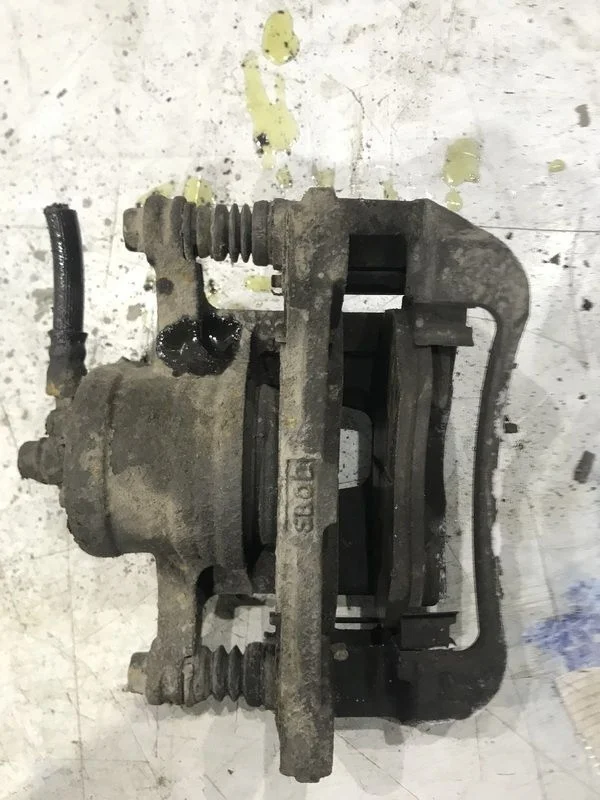 Суппорт тормозной передний правый Chevrolet Aveo I (2003—2008)