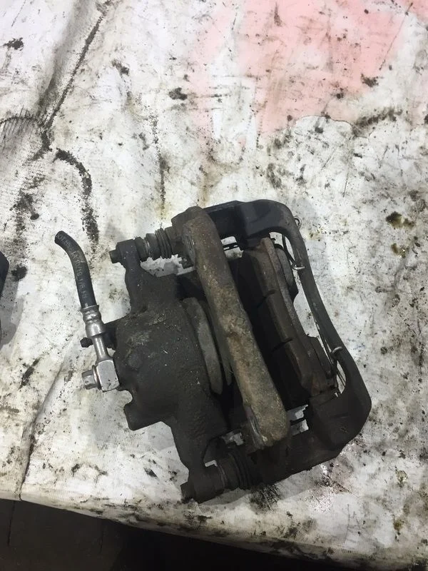 Суппорт тормозной передний правый Chevrolet Cruze I (2009—2012)